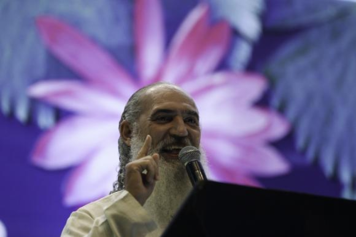 O líder espiritual Sri Prem Baba faz palestra no Águas pela Paz - II Seminário Internacional Água e Transdisciplinaridade, evento preparatório para o Fórum Mundial da Água (Foto: Fabio Rodrigues Pozzebom/Agência Brasil)